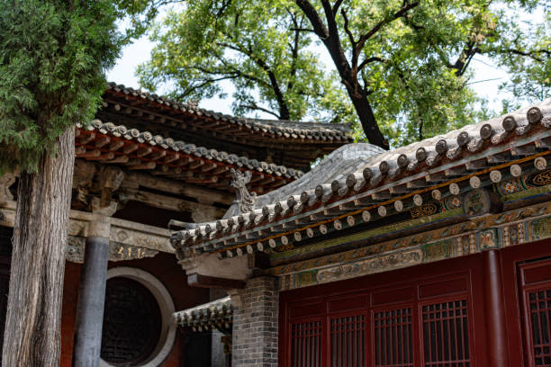 It has carved wooden dragons coiled around the eight pillars that support its upward-curving double-eave roof. The complex includes a classical garden with a 3,000-year-old cypress dating from the Zhou Dynasty. To the west of Hall of the Holy Mother is a temple dedicated to the deity Shuimu. Next to Jinci is the Wang Family Hall, a private villa built in 1532 (492 years ago) for Wang Qiong, a high-ranking official during the Ming Dynasty. the hall of the holy mother in jinci temple, taiyuan, shanxi: one of the three treasures of jinci, an ancient building.the best known structure at jinci is the hall of the holy mother (圣母殿, shèngmǔdiàn), which was constructed from 1023 to 1032 (99