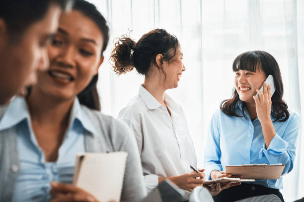 istock Asian office worker with smile working together in office. Habiliment 2163534297