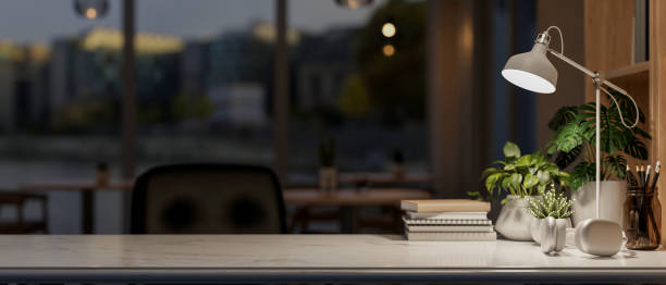 istock A copy space for displaying products and decors on a white marble table in a dark room. 2163537575