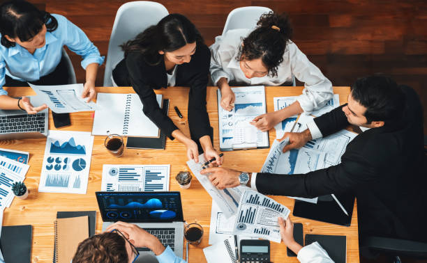 istock Panorama top view diverse analyst team analyzing financial data. Habiliment 2163539067