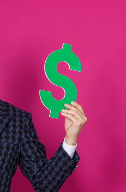 Hand holding dollar sign