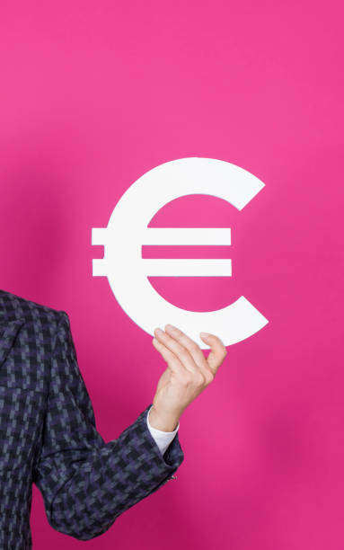 Hand holding euro sign