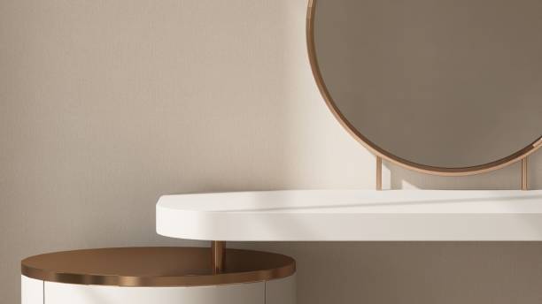 istock Modern, minimal white dressing table, gold steel frame round vanity mirror in sunlight on beige white wallpaper wall bedroom 2163545475