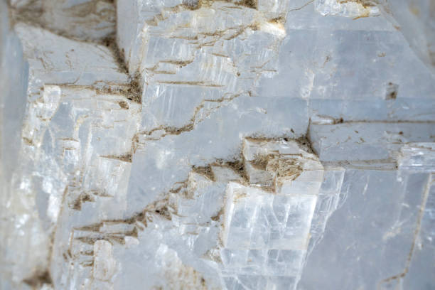Desert rose, crystal cluster from Tunisia, front view. Also known as rose rock, Sahara, selenite, gypsum and barite rose. Rose-like formation, including sand grains. Iron oxides give it a rusty tone.