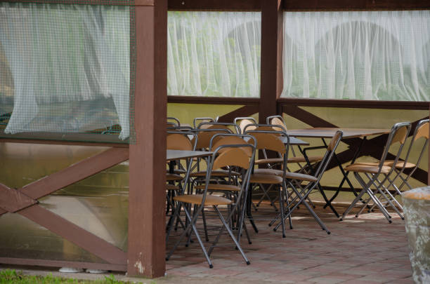 istock Summer tent with chairs stacked outside for celebration 2163548278