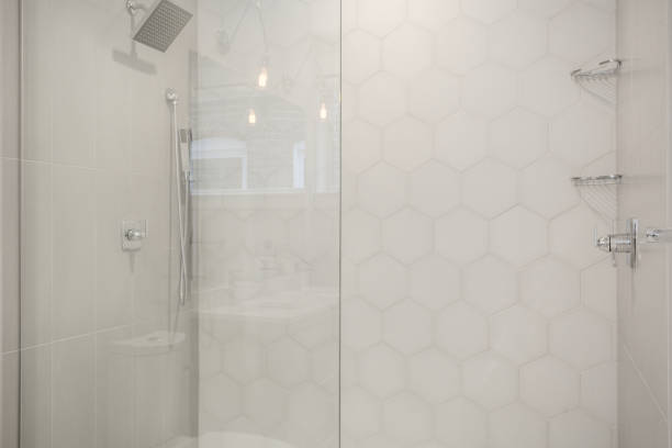 istock Luxurious Bathroom With Hexagon Tile Shower And Transparent Glass Enclosure. 2163548421