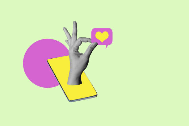 istock A hand is holding a cell phone with a heart symbol on it 2163550334