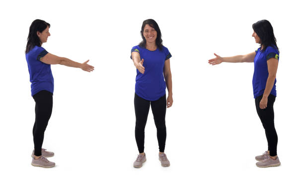 istock various poses of same woman shaking hands with imaginary person on white background 2163550631
