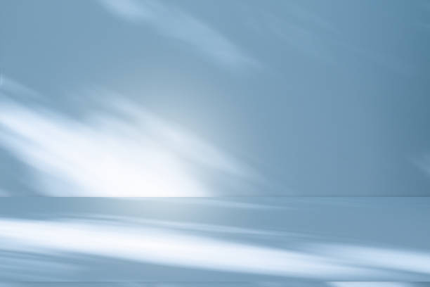 istock Studio style background wall decoration presentation uses white and blue tones. with shadows cast from a nearby window, concept creating a decorative 2163551751