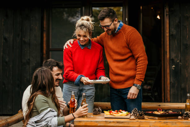 istock Friends and family eating 2163554047
