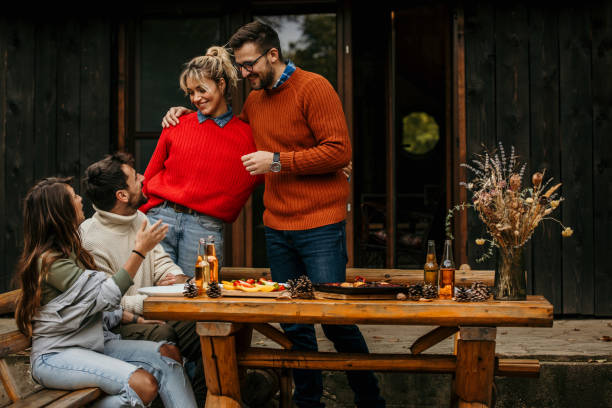istock Friends and family eating 2163554076