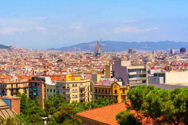 Barcelona, Spain - July 16, 2024: Expansive view of Barcelona's vibrant cityscape, highlighting colorful architecture against a scenic backdrop