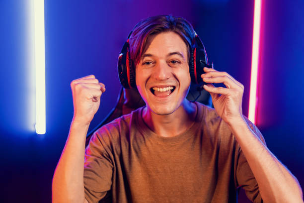 istock Host channel of smart streamer playing online game to be winner. Pecuniary. 2163554626