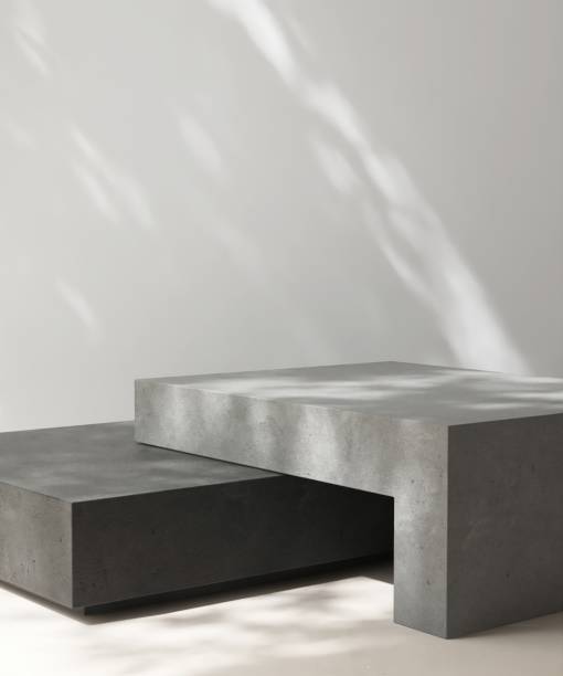 istock Gray and black geometric shape natural rock stone platform in dappled sunlight on white wall 2163554826