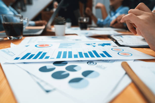 istock Focus financial data dashboard paperwork and blurred background. Habiliment 2163556518