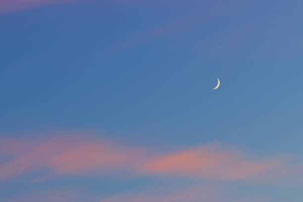 istock moon rise over colorful sunset 2163560575