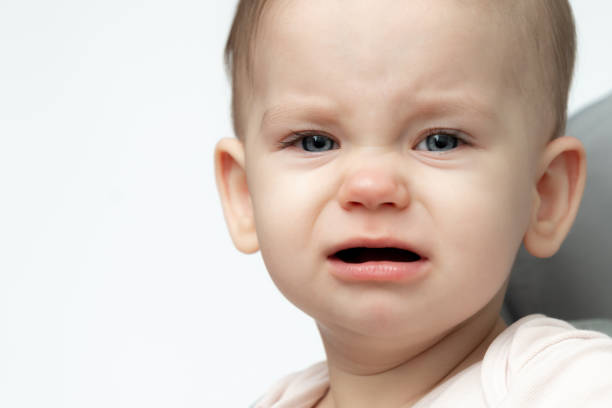 istock Crying Baby Closeup: Hunger and Sleep Needs. Concept of Immediate Care 2163561877