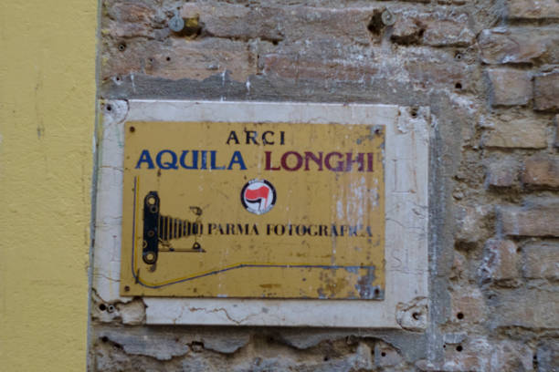 Parma, Italy July 24th 2024 Old weathered sign showing a vintage camera, evoking the history of photography and the charm of bygone eras