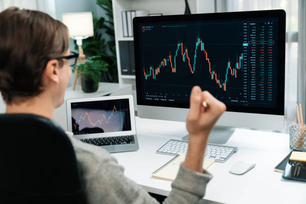 istock Smart business trader successful highest profit with back side. Pecuniary. 2163564869