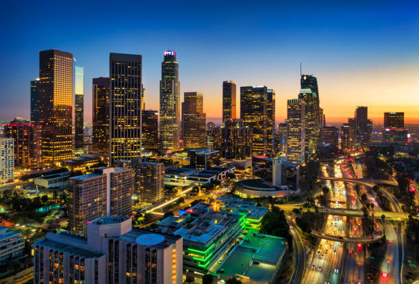 istock Los Angeles Downtown Aerial At Sunset With Freeway 2163565689