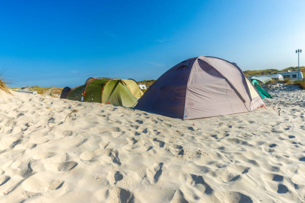 istock Tents in the sand dunes 2163566114
