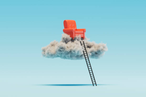istock Stairs to armchair in clouds on blue background 2163568256