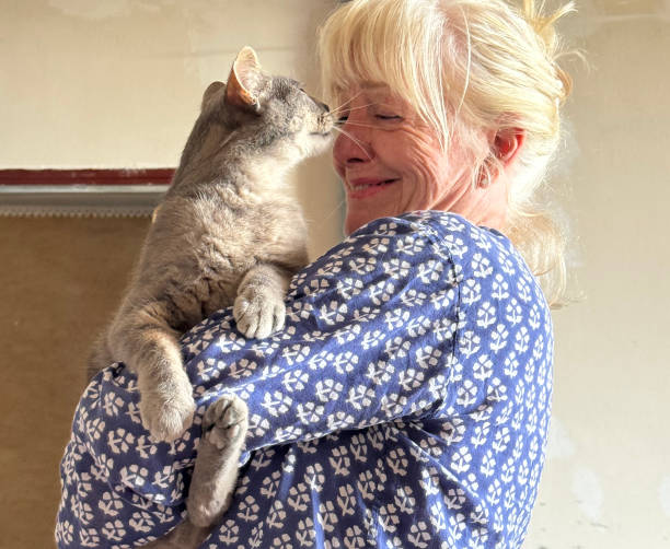 Senior woman with family pet