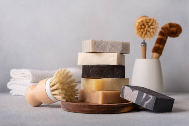 istock Stack of organic soap bars and bamboo dish brushes 2163568892