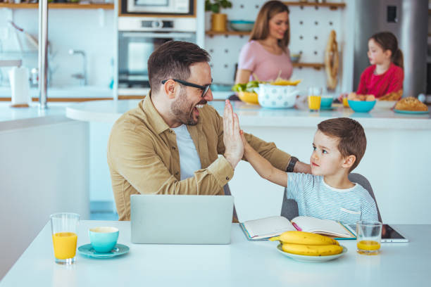 istock Father and Son Bonding Over Laptop at Home 2163573870
