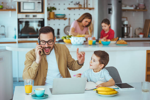 istock Family Bonding Over Technology and Meal Prep 2163573877