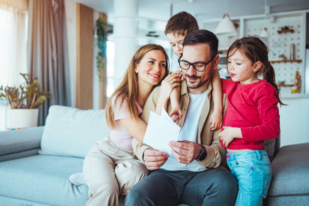 istock Family Bonding Time in Cozy Home Setting 2163573893