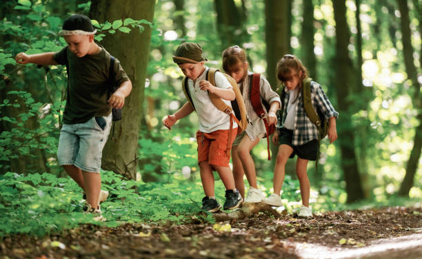 Family in a green forest.