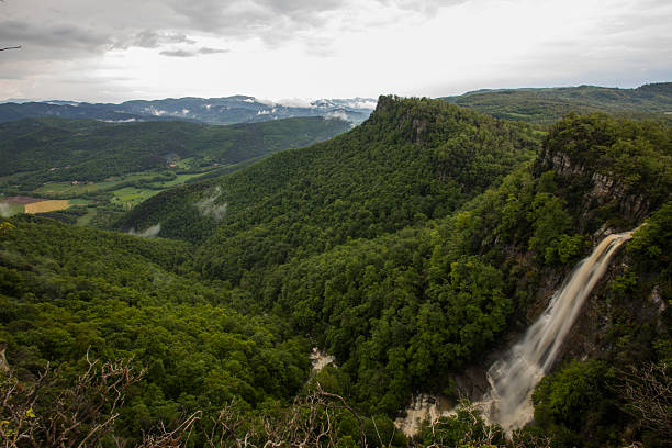 Spring sunset in Salt De Coromina waterfall, La Garrotxa, Spain.