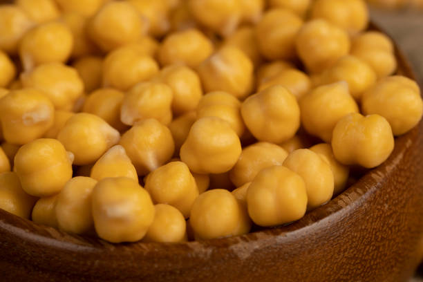 yellow chickpeas porridge during cooking, chickpeas porridge during cooking close up