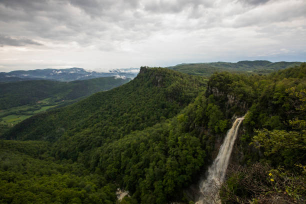 Spring sunset in Salt De Coromina waterfall, La Garrotxa, Spain.