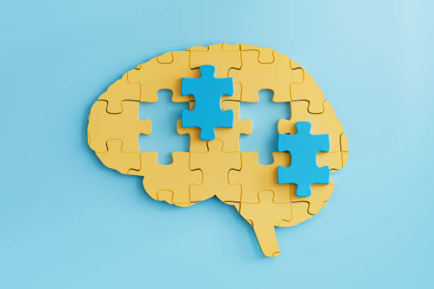 istock Mental health, jigsaw pieces, puzzle in brain shape on black background 2163586020