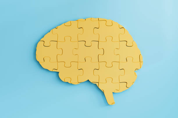 istock Mental health, jigsaw pieces, puzzle in brain shape on black background 2163586105
