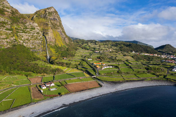 Azores Islands Pico Volcano Mountain Peak with low hanging clouds on Pico Islands. The Pico Volcano is a dormant Stratovolcano and with 2351m above sea level  (as the Azores Islands belong to Portugal) the Pico Volcano is the highest Mountain of Portugal. Mount Pico Volcano, Pico Island, Azores, Portugal, Atlantic Islands