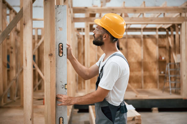 istock Leveling device. Industrial worker in wooden warehouse 2163587674