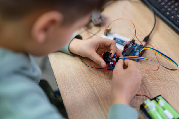 istock an engineer is engaged in the development and layout of electrical circuits 2163591456
