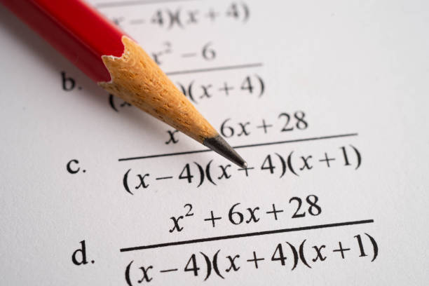 istock Pencil on mathematic formula exercise test paper in education school. 2163598667