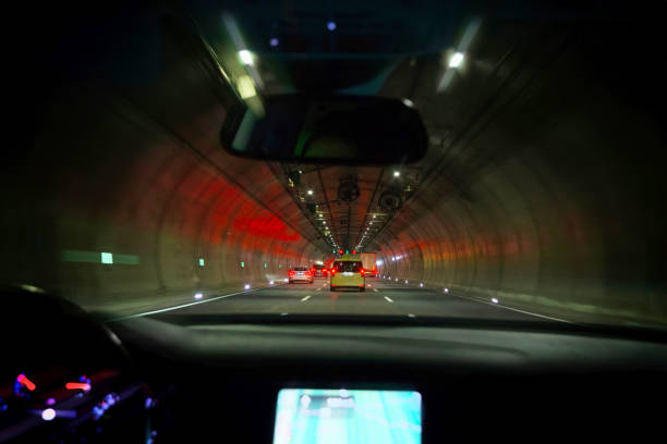 istock Car driving through a tunnel 2163606433
