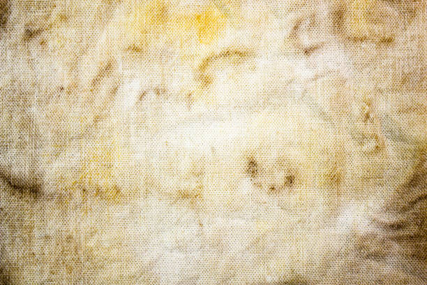 Abstract background and close-up of Beige Washi paper with rough fibers.