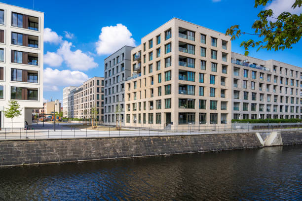 istock Modern Apartment Buildings Along a River in Berlin, Germany 2163615055