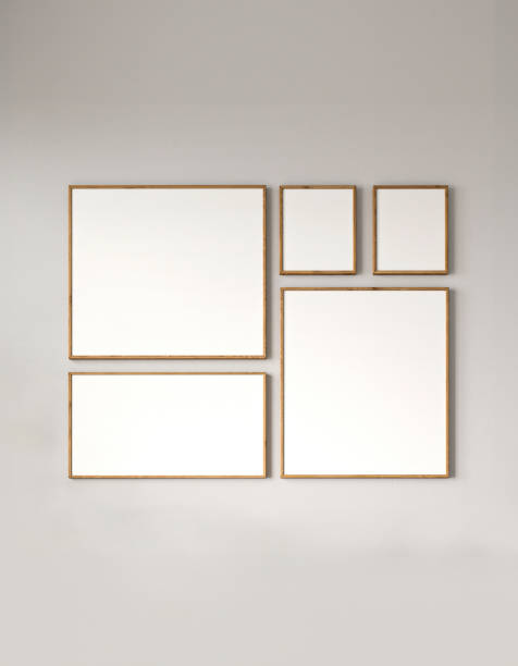 Modern gallery wall with a collection of empty picture frames on a muted background, 3d rendering