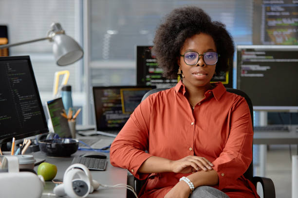 istock Black Female Virtual Reality Engineer in Company Office 2163621573