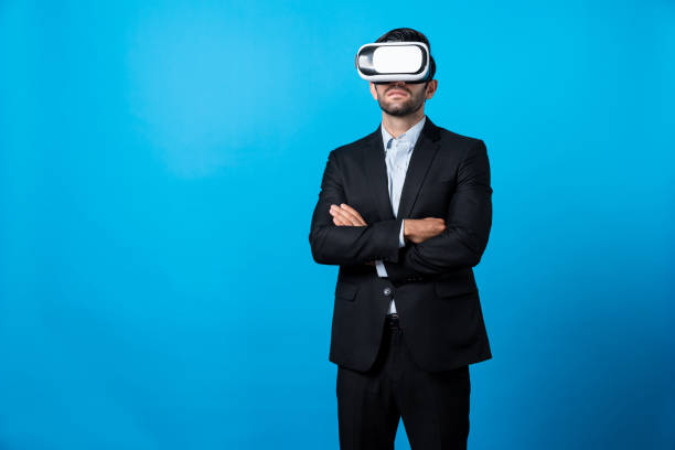 istock Smart business man crossing arms and standing at white background. Deviation. 2163625969