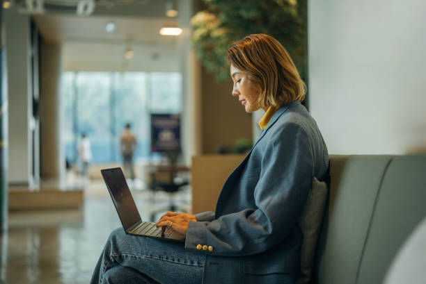 istock Business owner woman in green office working 2163629507
