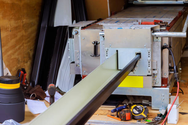 istock An automatic bending machine is used to bend rain gutters made of thin a metal 2163629537