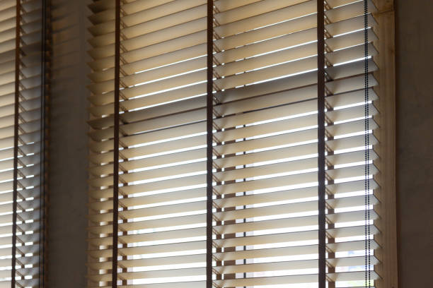 istock The window blinds are white and wooden 2163629984